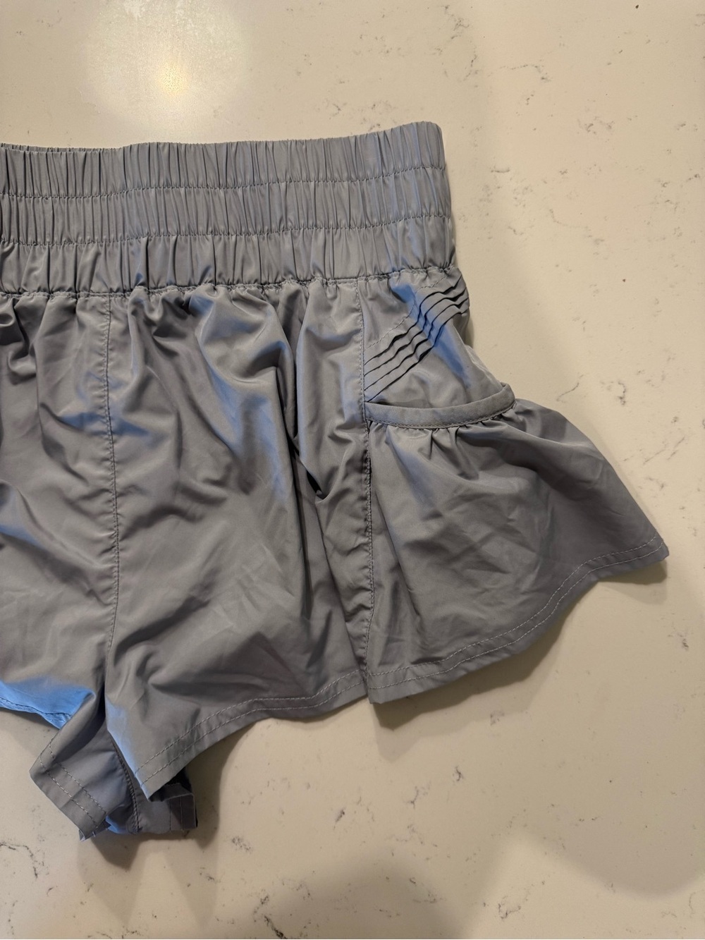 FP Movement Get Your Flirt On Ruffle Running Shorts Gray SP - Picture 3 of 8